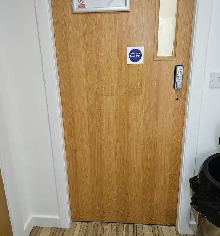 Wooden door with push code lock